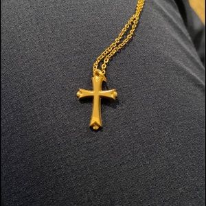 Gold-plated cross necklace and chain.